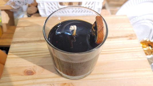 Whiskey sour candle close-up showing detailed drink layers and authentic cocktail appearance