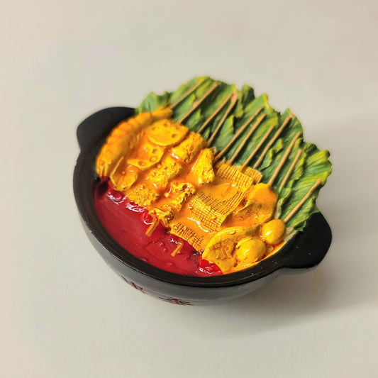 Skewer hotpot magnet close-up showing detailed ingredients and traditional hotpot presentation