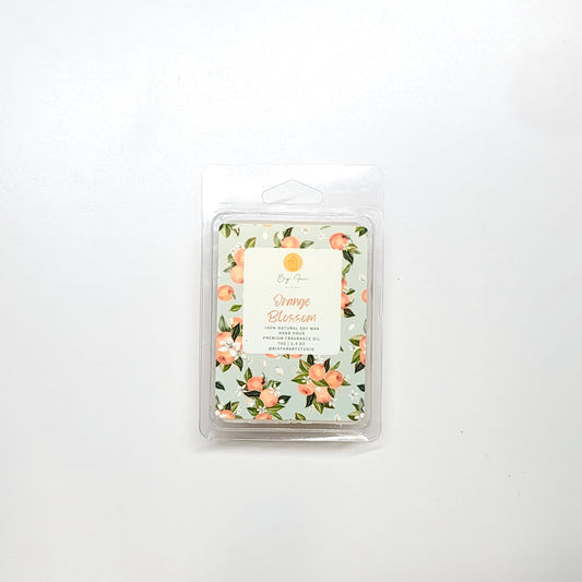 Orange blossom wax melt close-up showing light color and aromatic floral fragrance