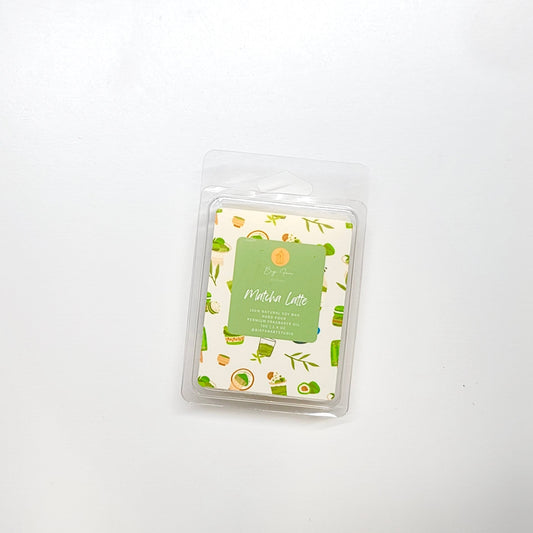 Matcha latte wax melt close-up showing green color and aromatic tea latte fragrance