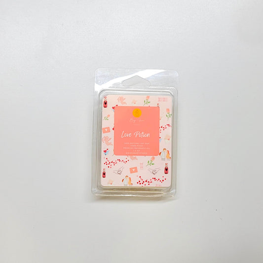 Love potion wax melt close-up showing pink color and enchanting sweet fragrance