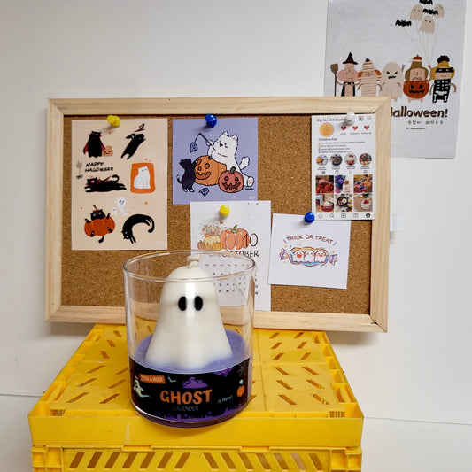 Halloween ghost jar candle close-up showing adorable face and charming jar appearance