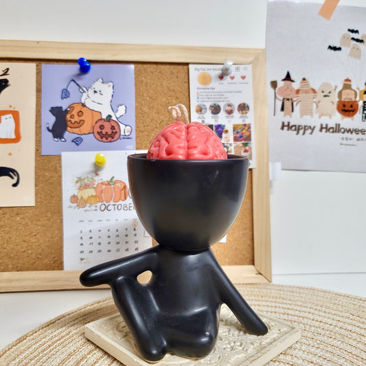 Brain boy candle close-up showing detailed brain texture and playful Halloween character appearance