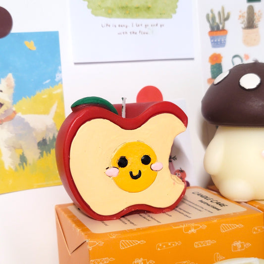 Apple buddy candle close-up showing sweet face and charming kawaii appearance
