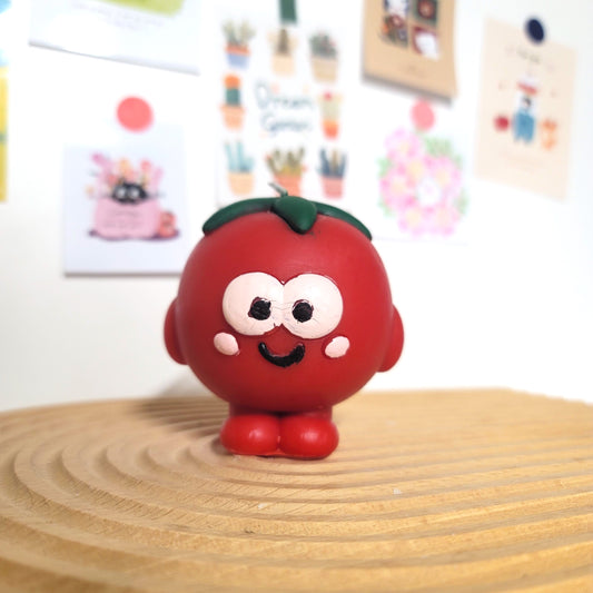 Tomato buddy candle close-up showing sweet face and charming kawaii appearance