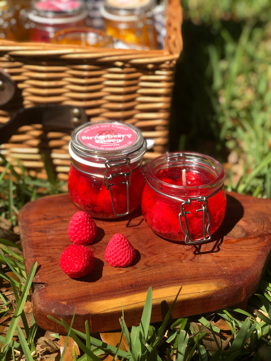 Jam jar candle close-up showing detailed glass jar and authentic fruit jam appearance
