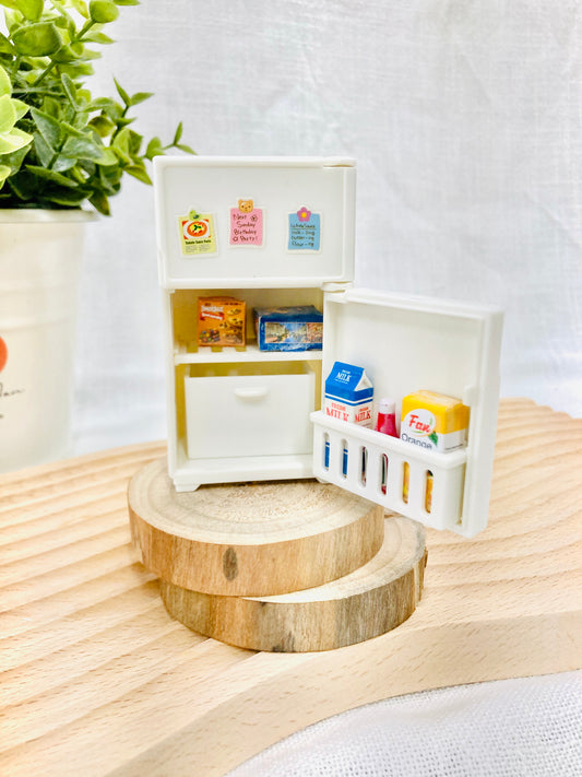 Mini fridge magnet close-up showing detailed door, handle and authentic refrigerator design