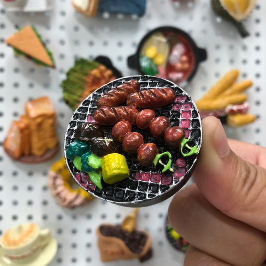 Barbecue magnet close-up showing detailed grill marks and authentic cookout design