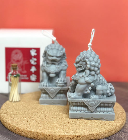 Jade lion guardian candles close-up showing detailed carved texture and authentic cultural symbolism