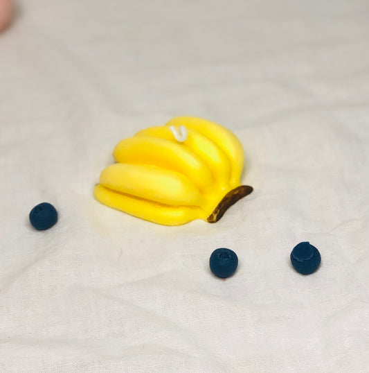 Banana candle with realistic yellow fruit design, fun botanical sculptural soy wax decor