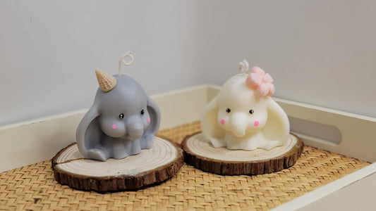 Little elephant candle close-up showing detailed trunk and ears, handcrafted baby animal art