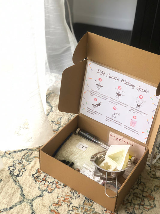 DIY candle kit contents showing wax, wicks, fragrance and tools for homemade candles