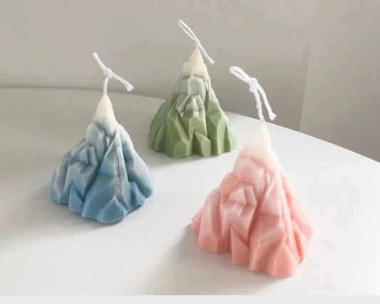 Volcano and iceberg candles close-up showing detailed texture and opposite element designs