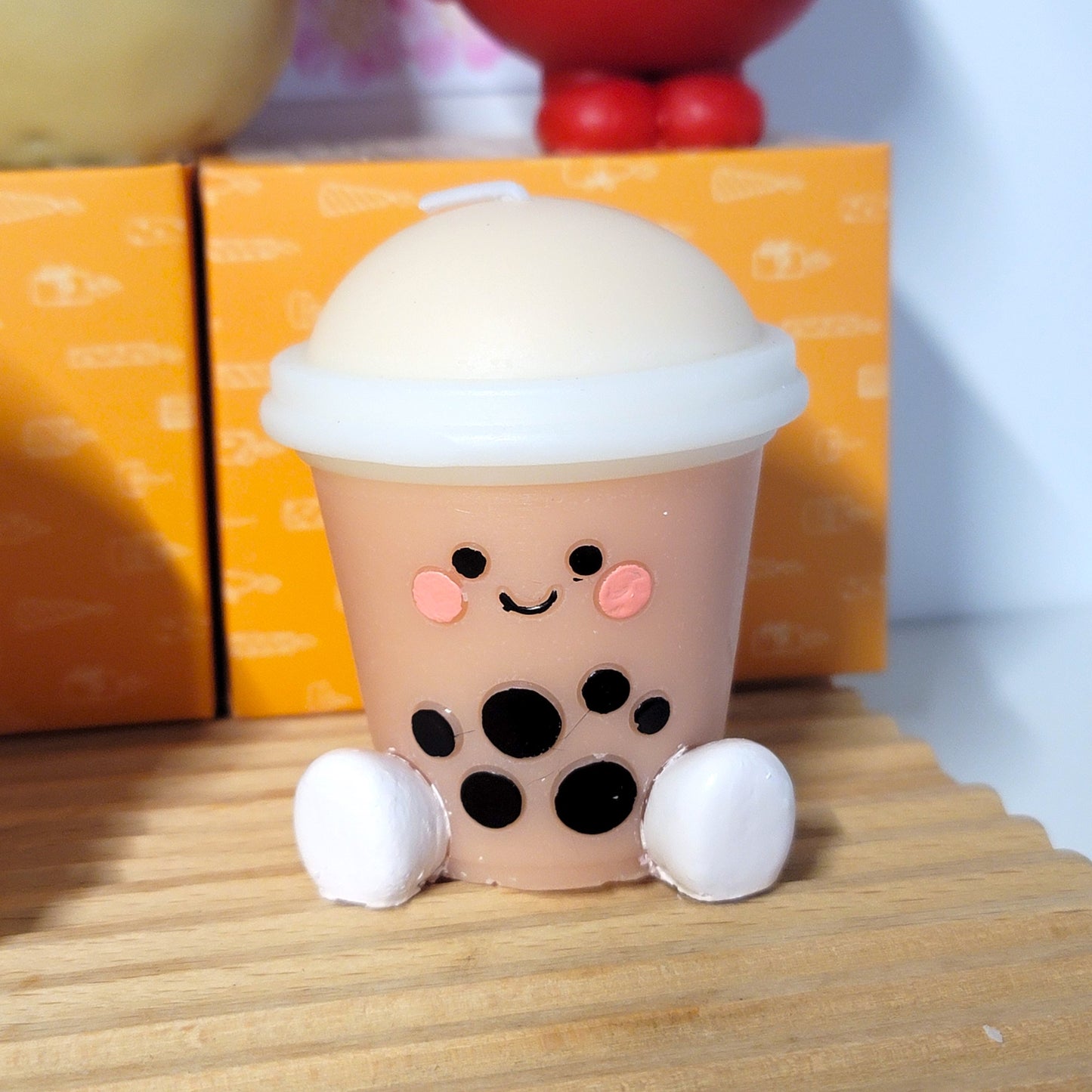 Boba tea buddy candle lifestyle shot, whimsical drink-inspired home decor accent