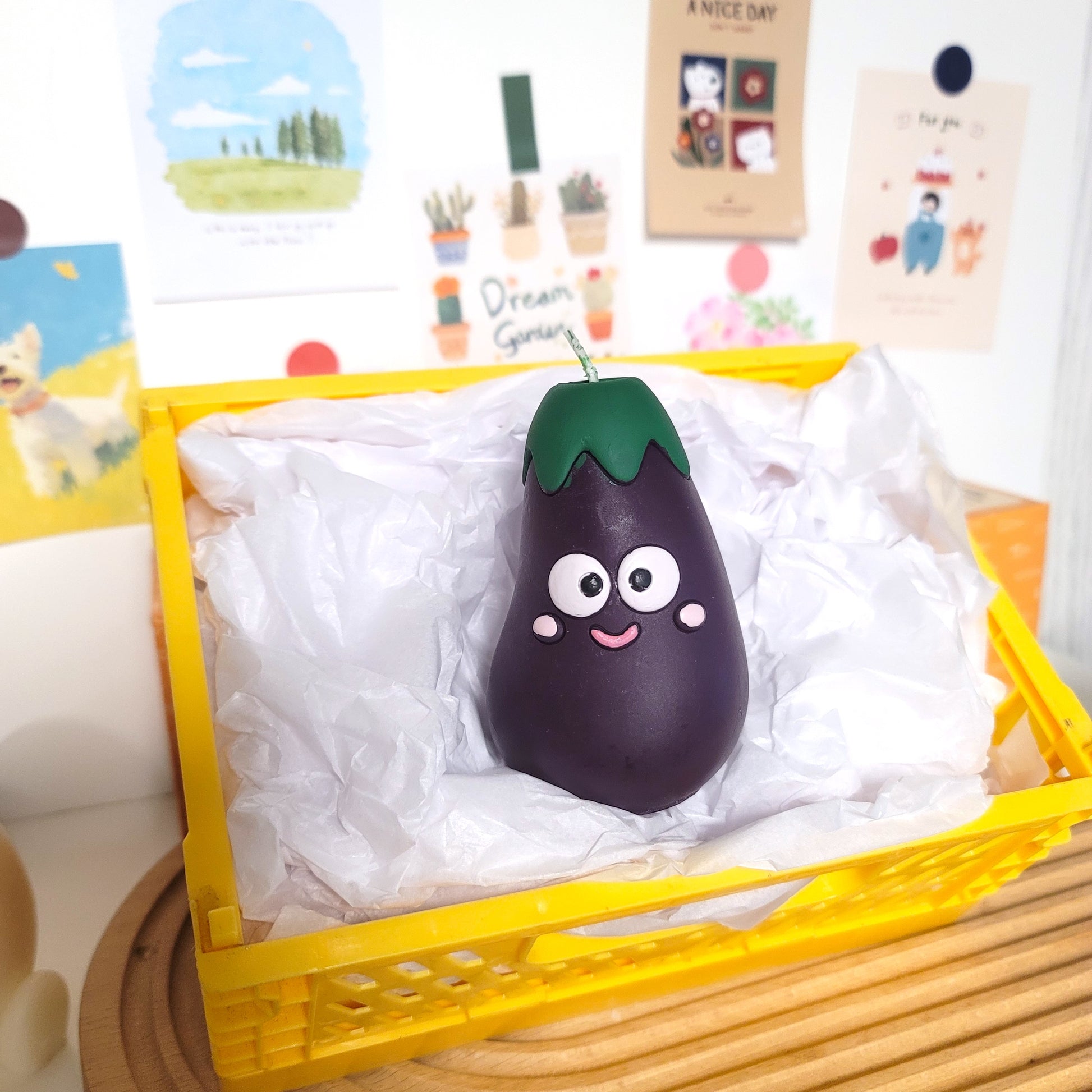 Handcrafted eggplant buddy candle, playful cute-themed decorative wax art piece