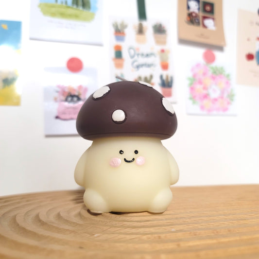 Mushroom buddy candle with cute face and forest scent, whimsical woodland character decor