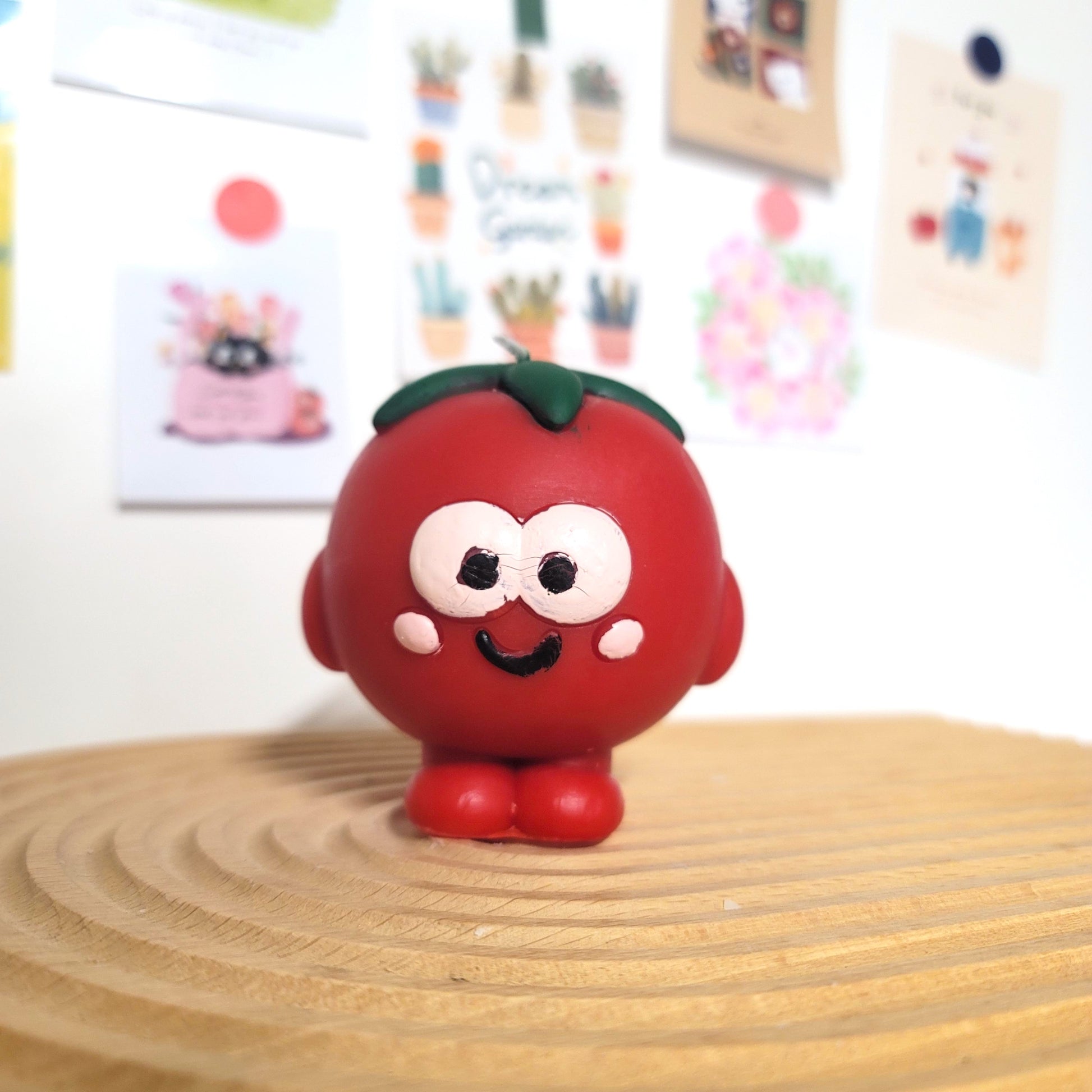 Tomato buddy candle close-up showing sweet face and charming kawaii appearance