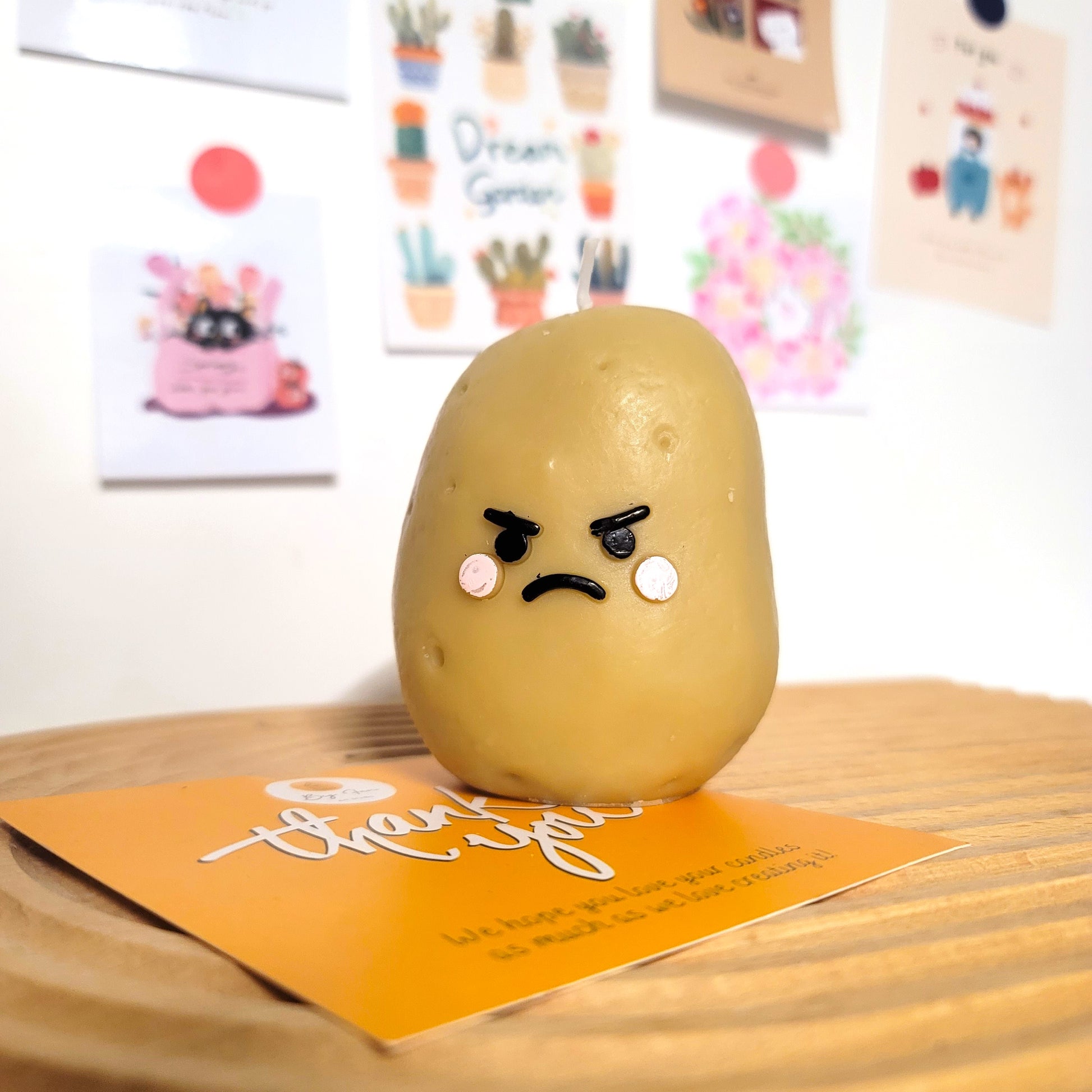 Potato buddy candle close-up showing sweet face and charming kawaii appearance