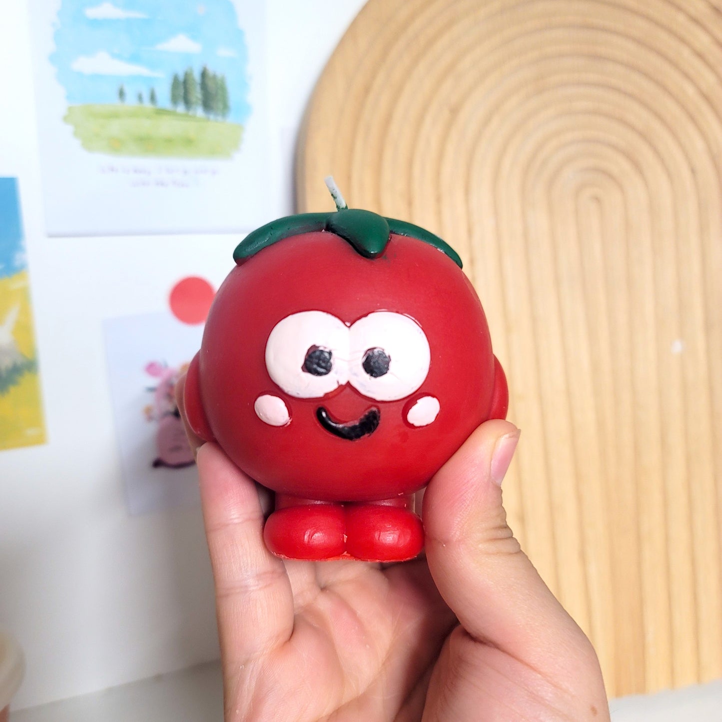 Tomato buddy candle with adorable smiling design, cute character sculptural soy wax decor